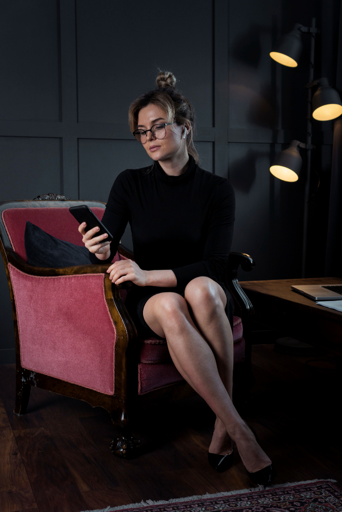 serious womandin black dress